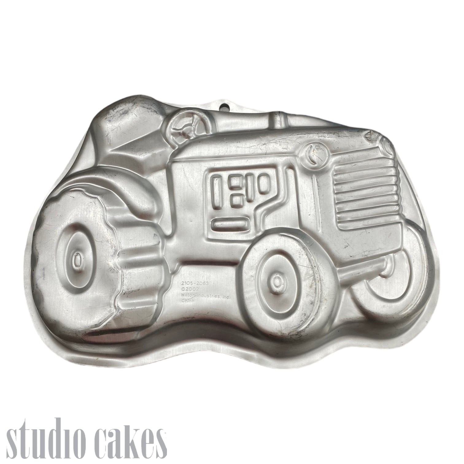 Tractor cake outlet tin